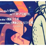 Graffiti mit Mann und dem Fred Ammon Zitat: Es lohnt die Mühe, zu verstehen, warum die Anderen manches anders sehen. Fred Ammon